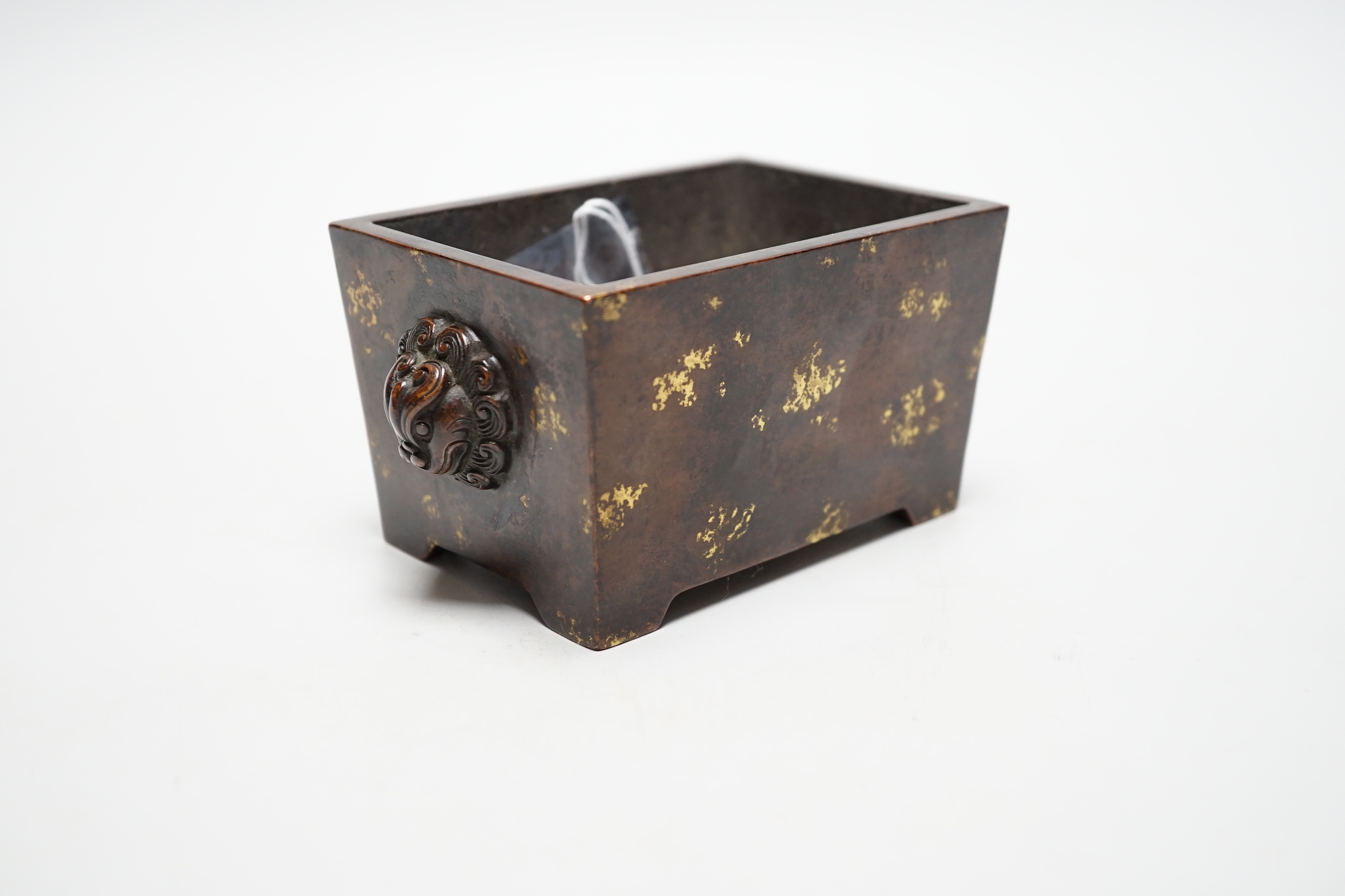 A Chinese gold splash bronze censer, fangding, 7cm tall